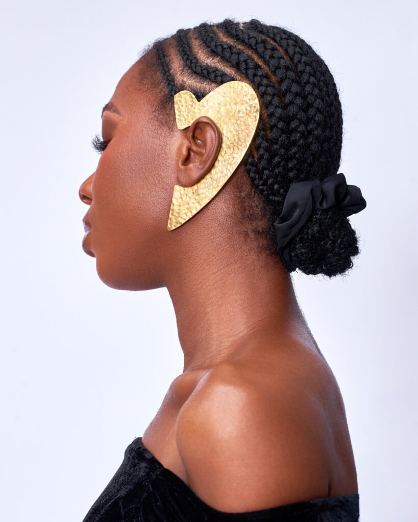 Not every crown sits on the head. Some hug the ear. There’s something about her. She doesn’t follow the crowd; she defines her own rhythm. Fearless in expression and rooted in self, she makes a statement without saying a word. That’s the essence of the Habun Ear Cuffs.